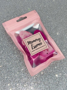 Our Strawberry & Cream wax melt releases a fresh, ripe strawberry fragrance on a sweet vanilla and cream base.  Please note colours and glitter may vary as each product is handcrafted.
