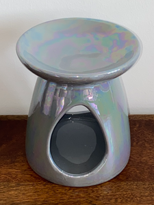 Ceramic burner with tear drop cut out design.  13cm x 11cm  All our burners include 4 x 4 hour tealights, complimentary of Memory Essence and two sample scents chosen at random from our collection.